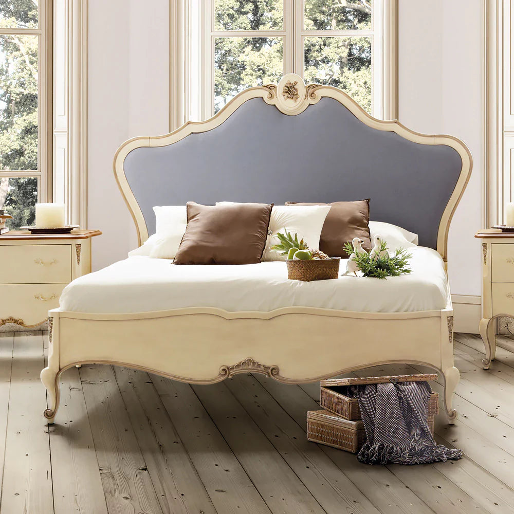 Elegant Wooden Bed with Hand-Carved Detailing and Tufted Headboard